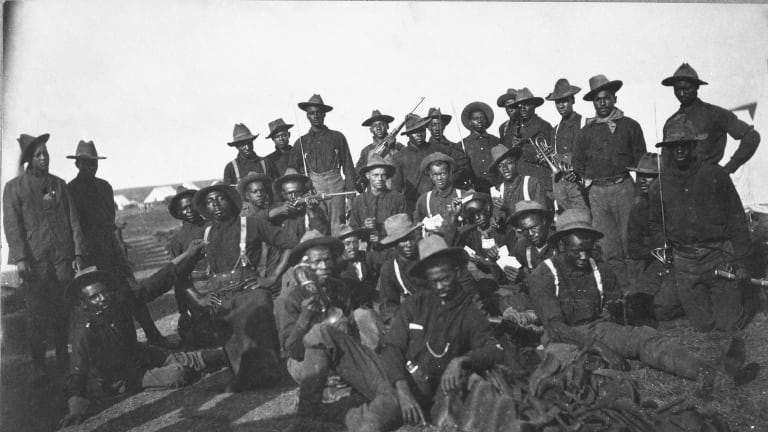 Group of African American men making up the Buffalo Soldiers