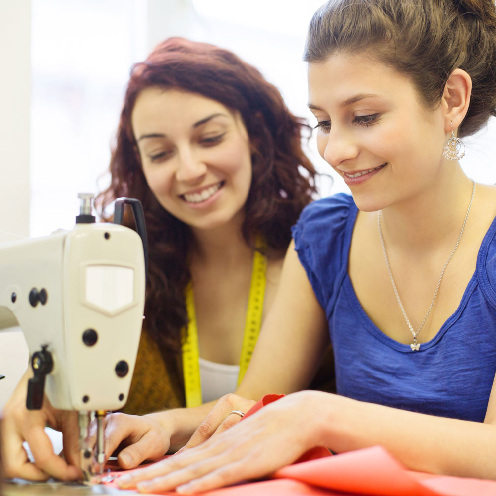 Two professional seamstresses.