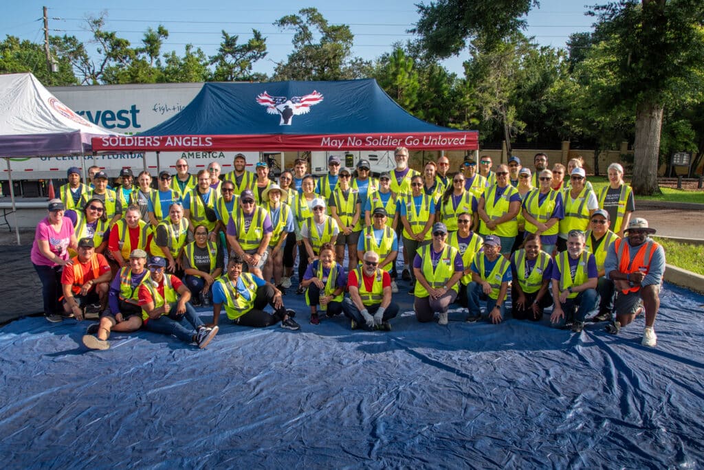 It takes a whole army of Soldiers' Angels volunteers to run each monthly food distribution.