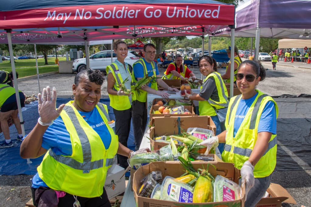 Soldiers' Angels volunteers packing groceries ahead of a recent event.