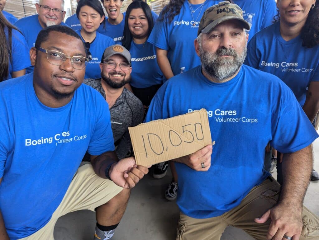 Breaking the record of most Soldiers' Angels hygiene kits packed in one day, this volunteer group from Boeing is a team to beat!