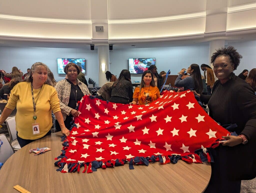 Navy Federal employees make blankets that will support Veterans impacted by Hurricane Helene.