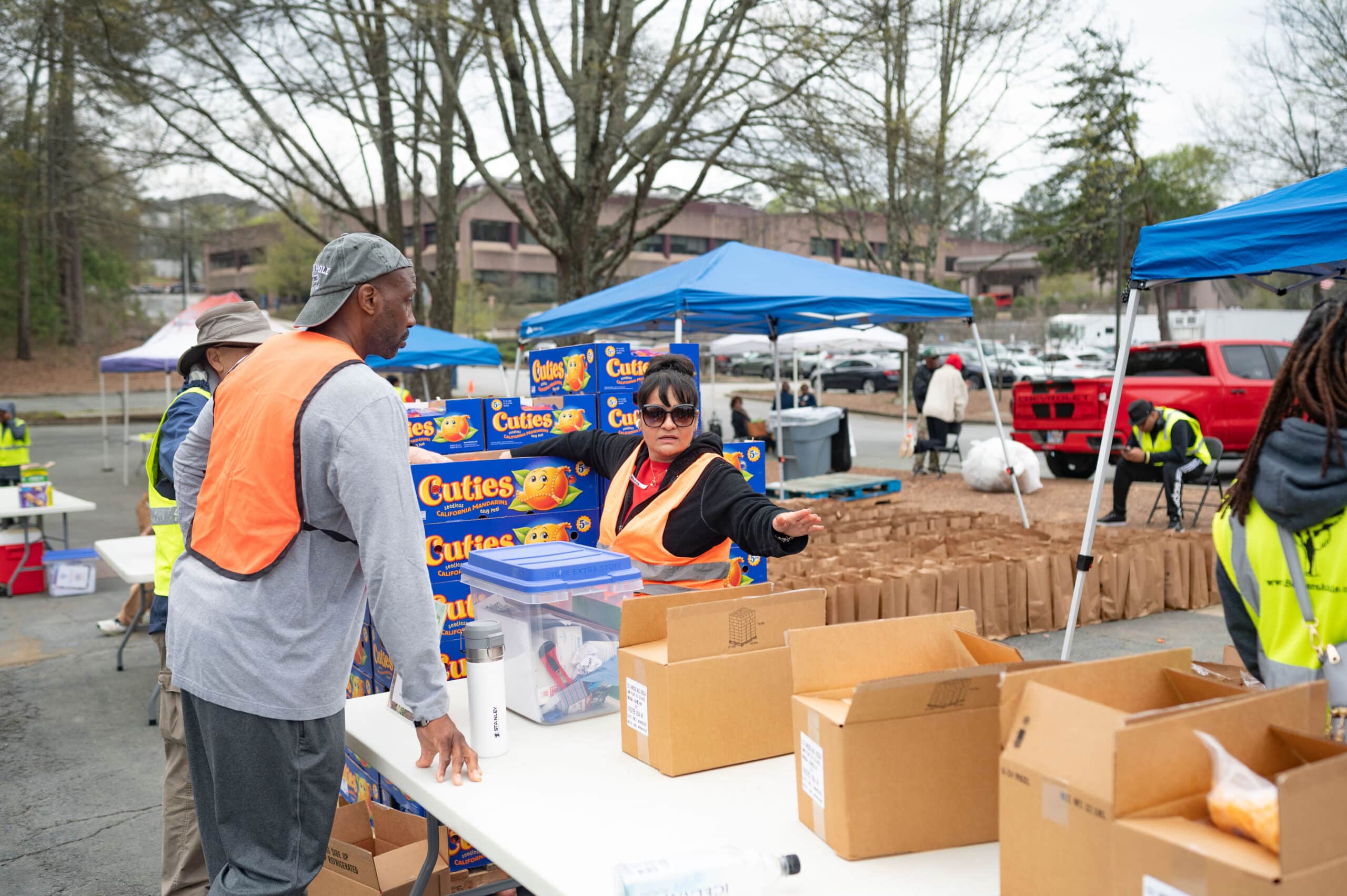 Soldiers' Angels volunteers serving veterans and service members at a food distribution event