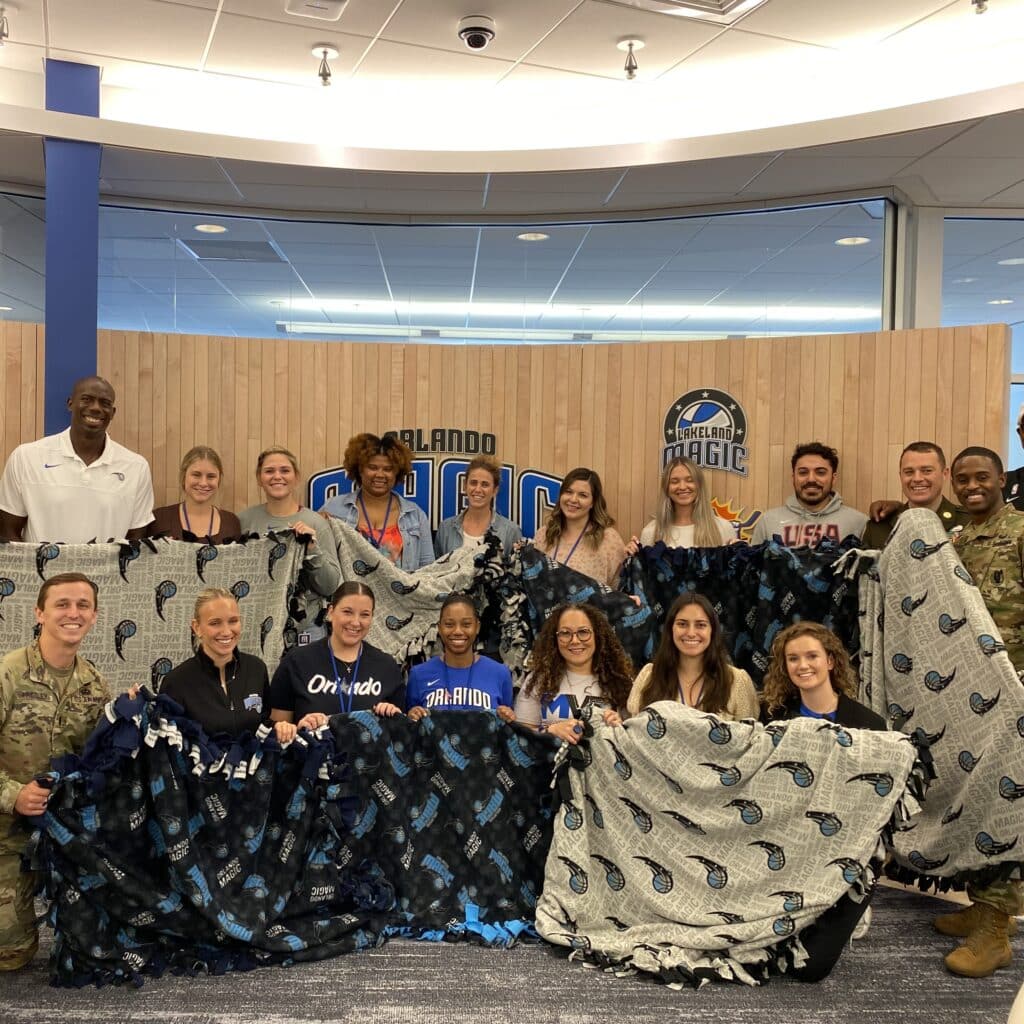 Orlando Magic hosted a Blanket Making Impact Event for Soldiers' Angels to create no-sew blankets for Service Members and Veterans.