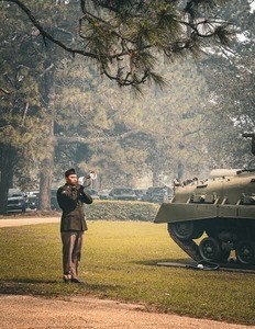"Taps" is a solemn melody performed on a trumpet or bugle, signaling significant moments in the military. This poignant tune is traditionally played at military funerals and memorial services, as well as marking the final call at U.S. military bases each evening.
